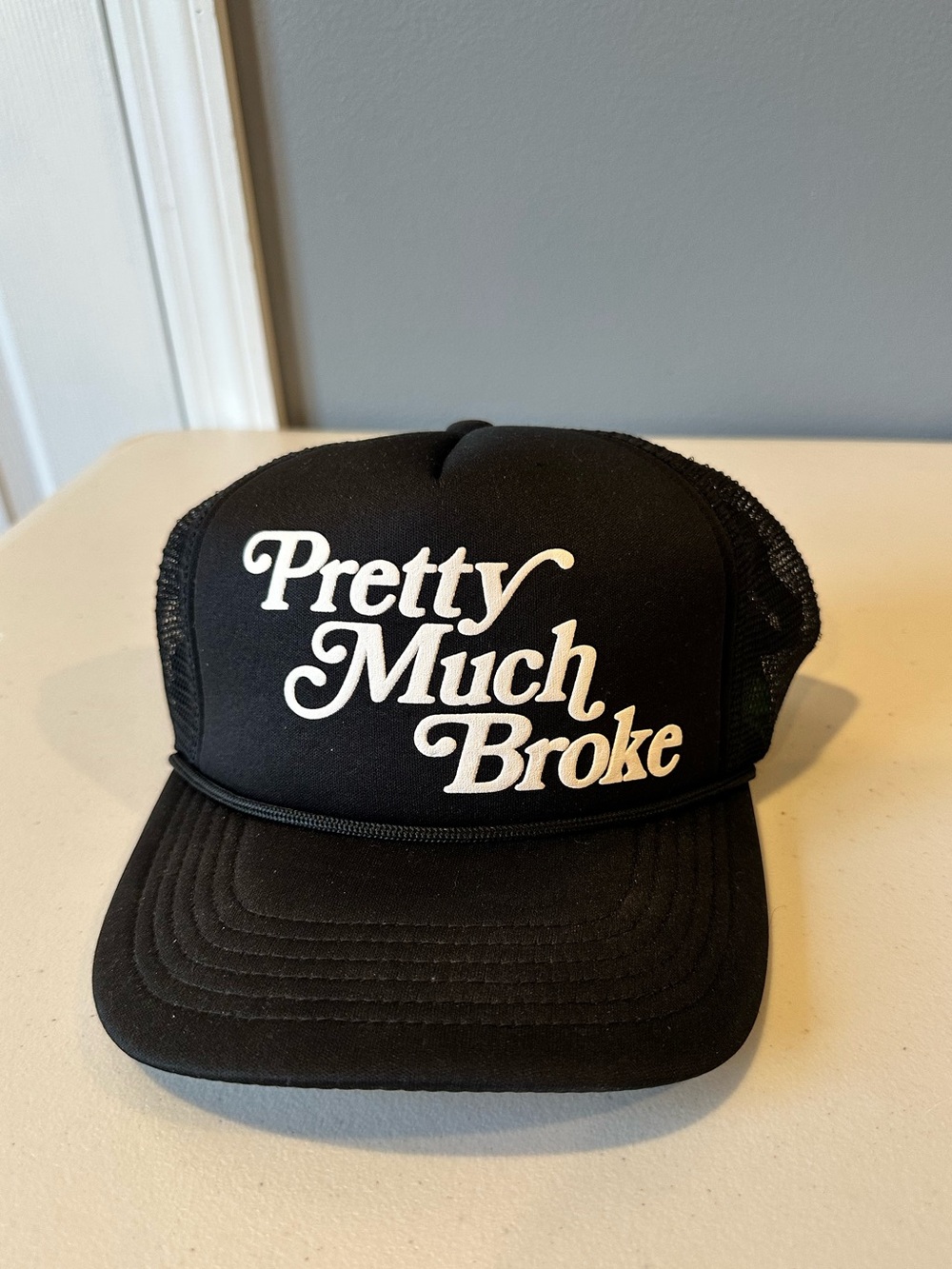 Pretty Much Broke® Trucker Hat by APTHCRY®